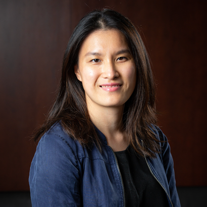 Woman in cardigan, in profile