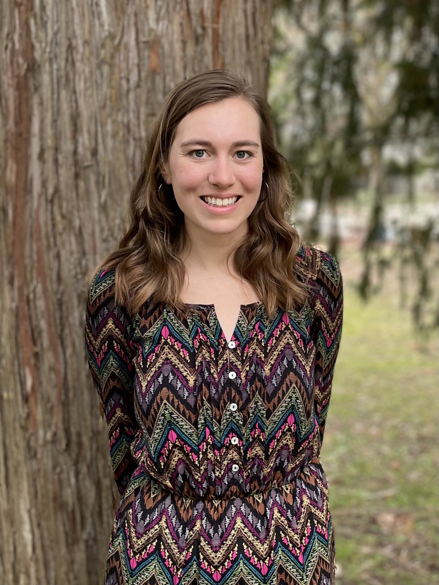 Madison Lore in front of tree