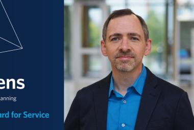 Mark in blazer, and APSC graphic plaque for award