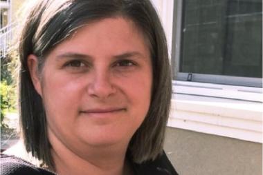 Dr. King-Scobie, outside by window-sill