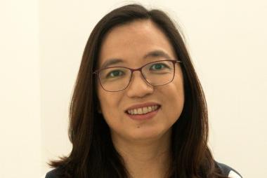 Dr. Feng against white backdrop