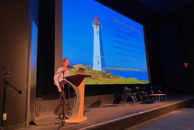 Keisha Maloney, current PhD rep, presenting at conference