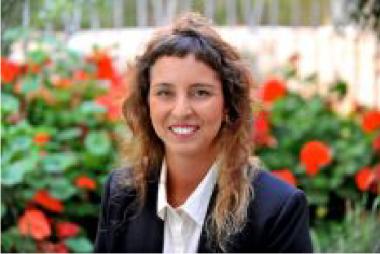 Lili, in bush-laden courtyard