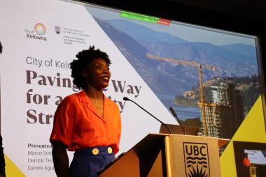 Student presenting findings to audience