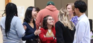 Students chatting at event