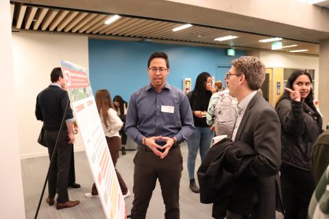 Hussein presenting to the Dean