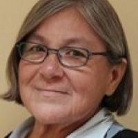 Leona, against brown background