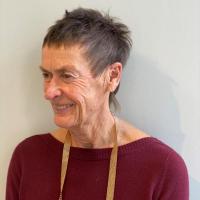 Leonie, in sweater and lanyard