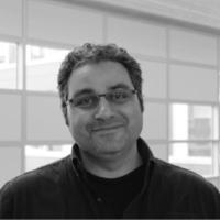 Maged, in many-windowed room